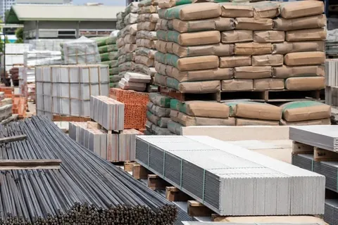 Steel, cement and building materials stored in a commercial supply yard